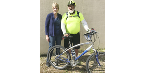 Bicyclist rides in  support of Honor Flight